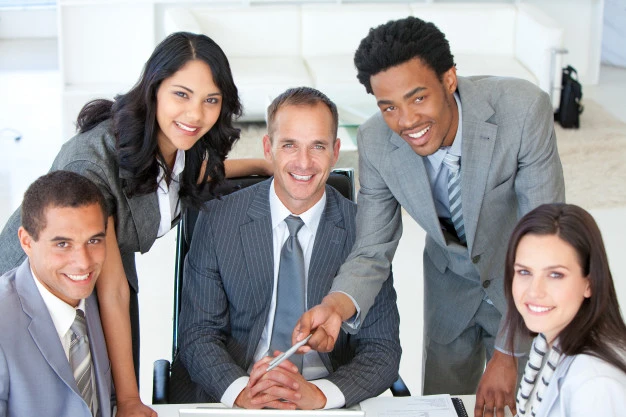 Three business professionals smiling